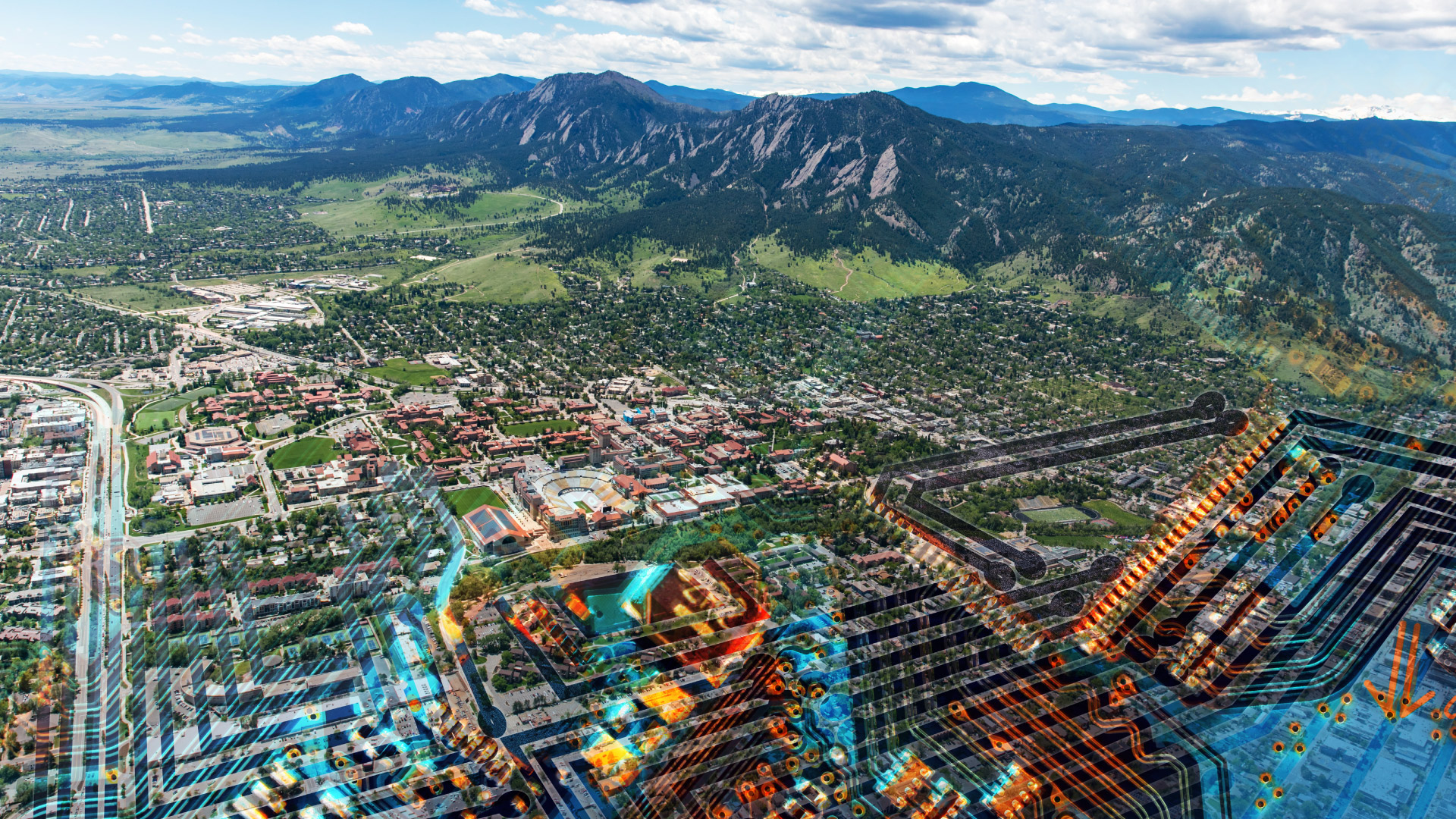 An aerial image of Boulder overlaid on a circuit board