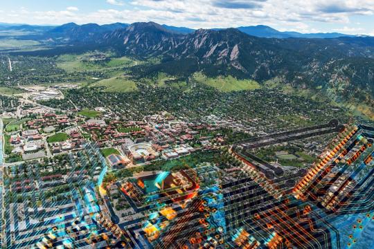 An aerial image of Boulder overlaid on a circuit board