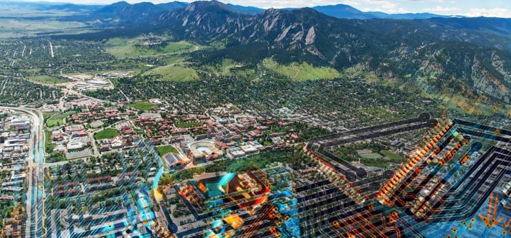 An aerial image of Boulder overlaid on a circuit board